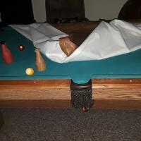 8 foot Billiards Table excellent condition solid 1 inch slate top includes cover, 10 cues, 2 racks