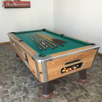 8' Pool Table In Excellent Condition. New felt. Includes Sticks.